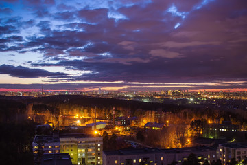 Fototapeta premium sunset over Yekaterinburg dusk night cloudy