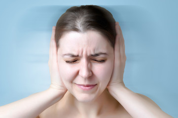 Woman suffering from noise