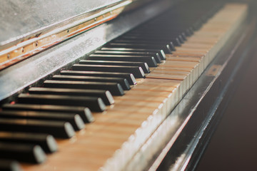     Old rusty piano keyboard, selective focus 