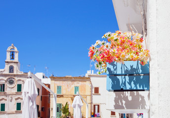 House decorated with flowers in Italy, Polignano a mare, Puglia