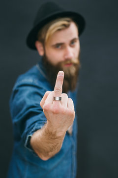 Portrait of hipster man in a studio