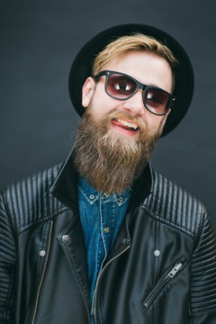 Portrait of hipster man in a studio