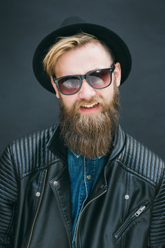 Portrait of hipster man in a studio