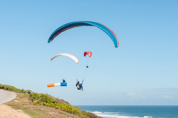 Fototapeta na wymiar Paragliders in the air