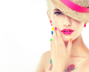 colorful makeup and manicure nails . Stylish blonde girl with bright makeup and colorful nail...