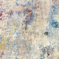 grunge wall of an old house with remainings of color