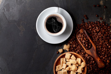 Coffee cup, beans and brown sugar