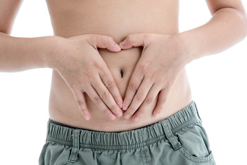 Fototapeta premium Boy's hands on stomach