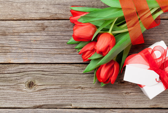 Red tulips and gift box
