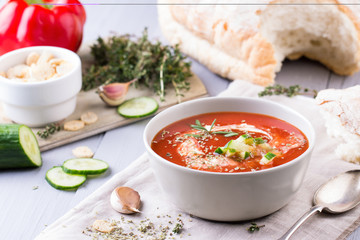 fresh tomato soup in a grey bowl