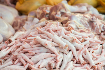 Chickens feet put it on the market for sale.