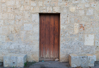 Fototapeta na wymiar A weathered brown door, Spain