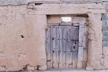 A weathered brown door, Spain