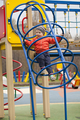 The three-year young boy on the playground