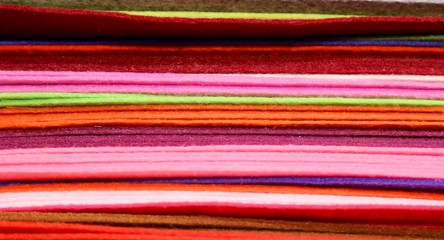 piles of colored felt for hobbyists and decorators in wholesale