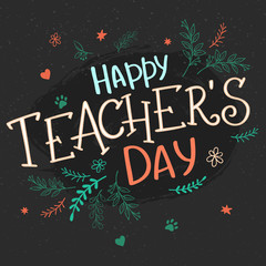 Fototapeta na wymiar vector hand drawn lettering with branches, swirls, flowers and quote - happy teachers day