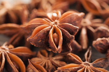 Heap of star anise on a wooden table