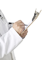 close-up hand of a doctor writing