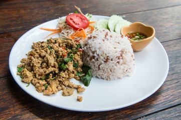 Rice topped with stir-fried pork and basil