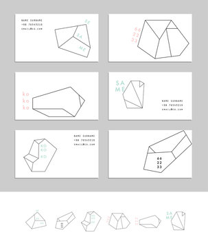 Collection of business cards with geometric outline shapes 