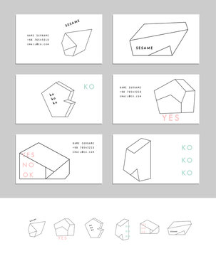 Collection of business cards with geometric outline shapes  