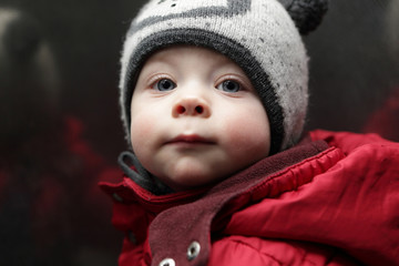 Toddler in red jacket