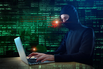 hacker at work with graphic user interface around