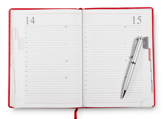 Red open diary with pen