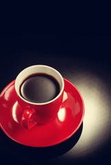 cup of coffee on black