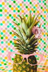 fashion pineapple on polka dot background, pop concept