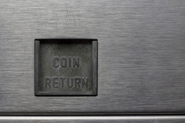 Coin Return Slot on a Pinball Machine 