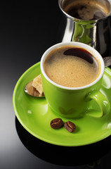 cup of coffee on black