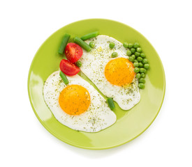 fried egg in plate isolated on white
