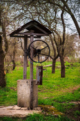 Old, neglected well in garden of Ukrainian village.