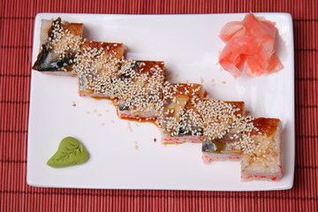Japanese seafood sushi./Japanese sushi seafood. Square slices of eel, rice, eggs and sesame.