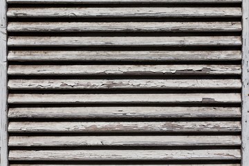 Obraz premium wooden shutters, covering a window or door