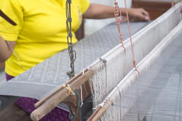 Thai traditional hand-weaving loom to make cloth.
