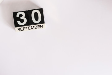 September 30th. Image of september 30 wooden table calendar on white background. Autumn day. Empty space for text. International Translation Day