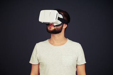 Man looking around using virtual reality glasses