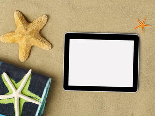 Tablet, towel and starfish