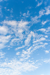 Fototapeta premium Bright sunny day with clouds. Cloudscape on blue sky.