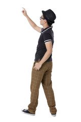 Naklejka premium rear view shot of a pointing man