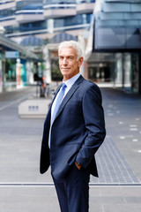 Portrait of confident businessman outdoors