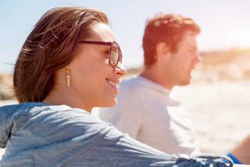 Fototapeta premium Portrait of young woman on beach