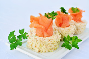Cream cheese roll canapes with smoked salmon