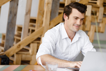 Fototapeta premium Young businessman in office