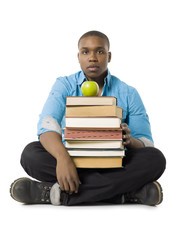 male student with books and apple