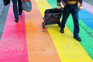 people crossing a street