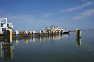 Car ferry docking at a Delaware Bay destination.