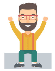 Man sitting with raised hands up.